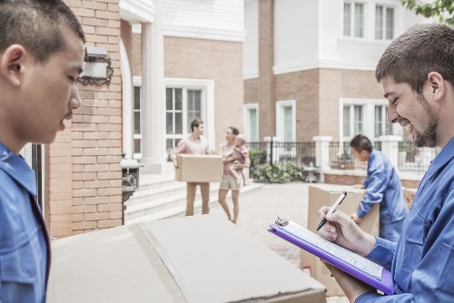 Professional removal company assisting with a home move in Andstorage